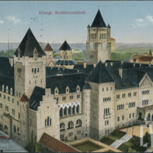 potężny zamek z wieżami pokryty spadzistym dachem