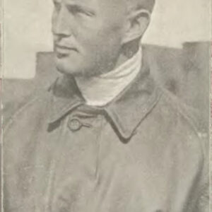 mężczyzna w średnim wieku pozujący do fotografii, ubrany w strój pilota