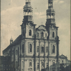 barokowa budowla sakralna z dwiema wysokimi wieżami i bogato zdobioną fasadą